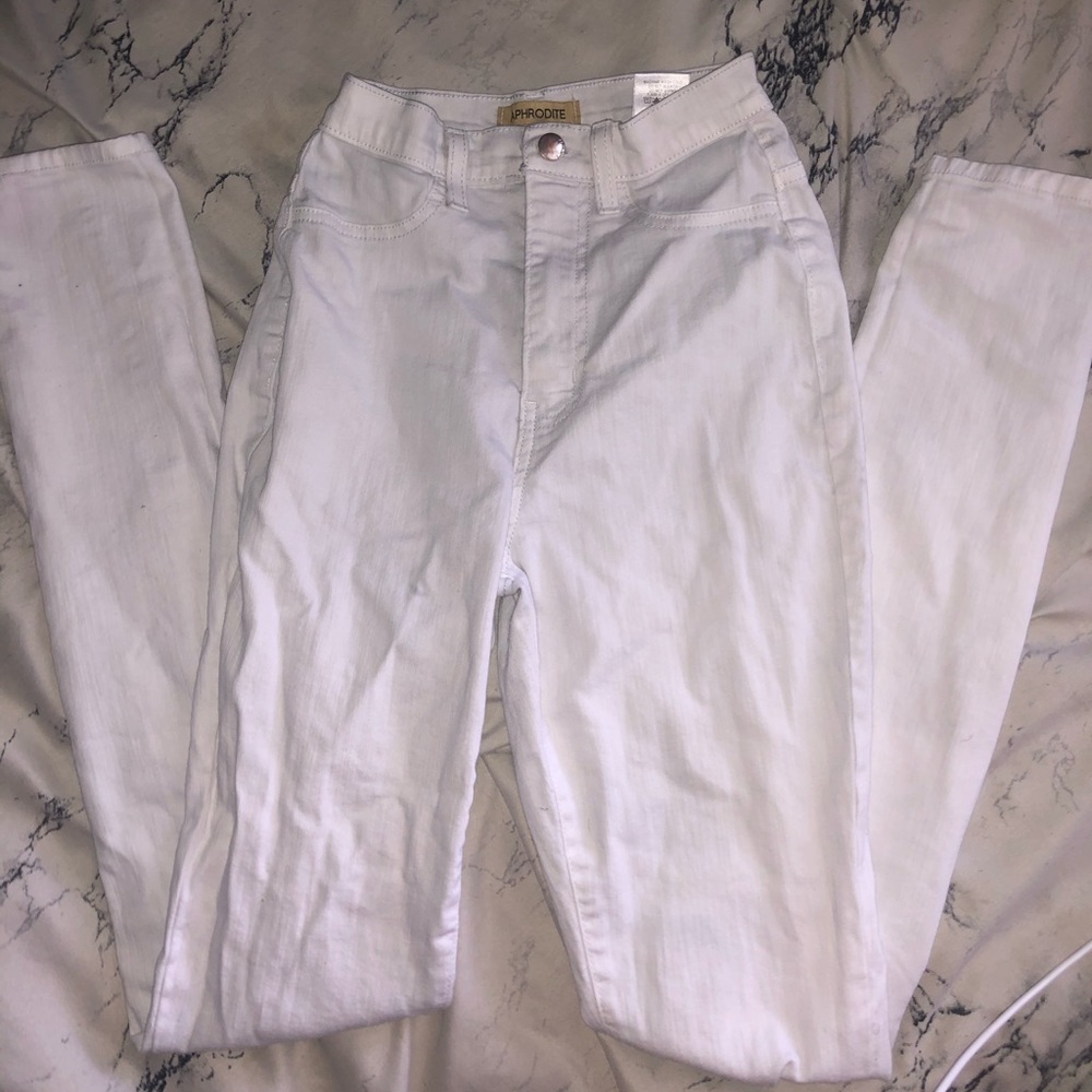 All white; torn at the knee APHRODITE size 7 jean